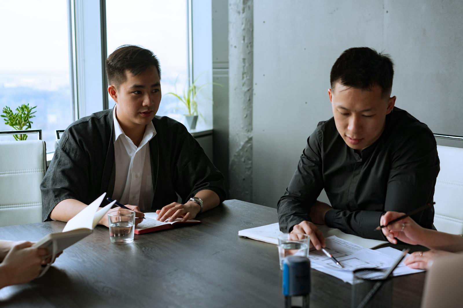 Small group of participants in discussion during a coffee break